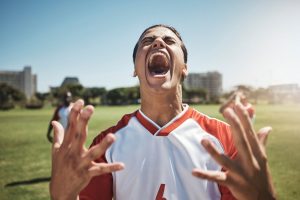 Sport athlete reacting having lost his mind on the pitch.