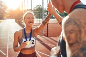 Athlete celebrating win after a mental toughness exercise