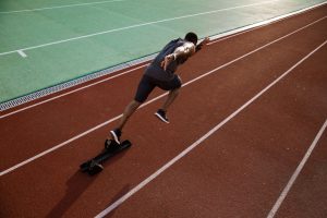 Young athlete who has his body and mind together taking off on the pitch