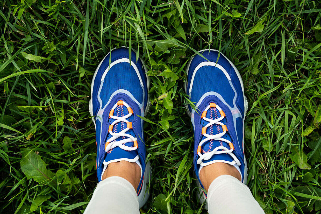 Why You Need Cycling Shoes with a Wide Toe Box - legs in a pair of blue shoes