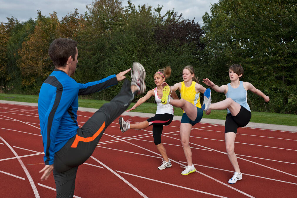 Reflex Before Workout - group of trainers doing reflexes