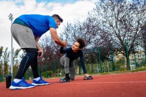 Return to sport personal training in Colorado - trainer and athlete working together